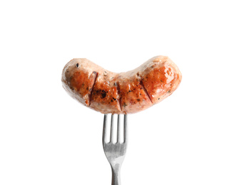 Photo of Fork with grilled sausage isolated on white