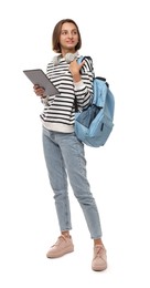 Photo of Young student with tablet, backpack and headphones on white background