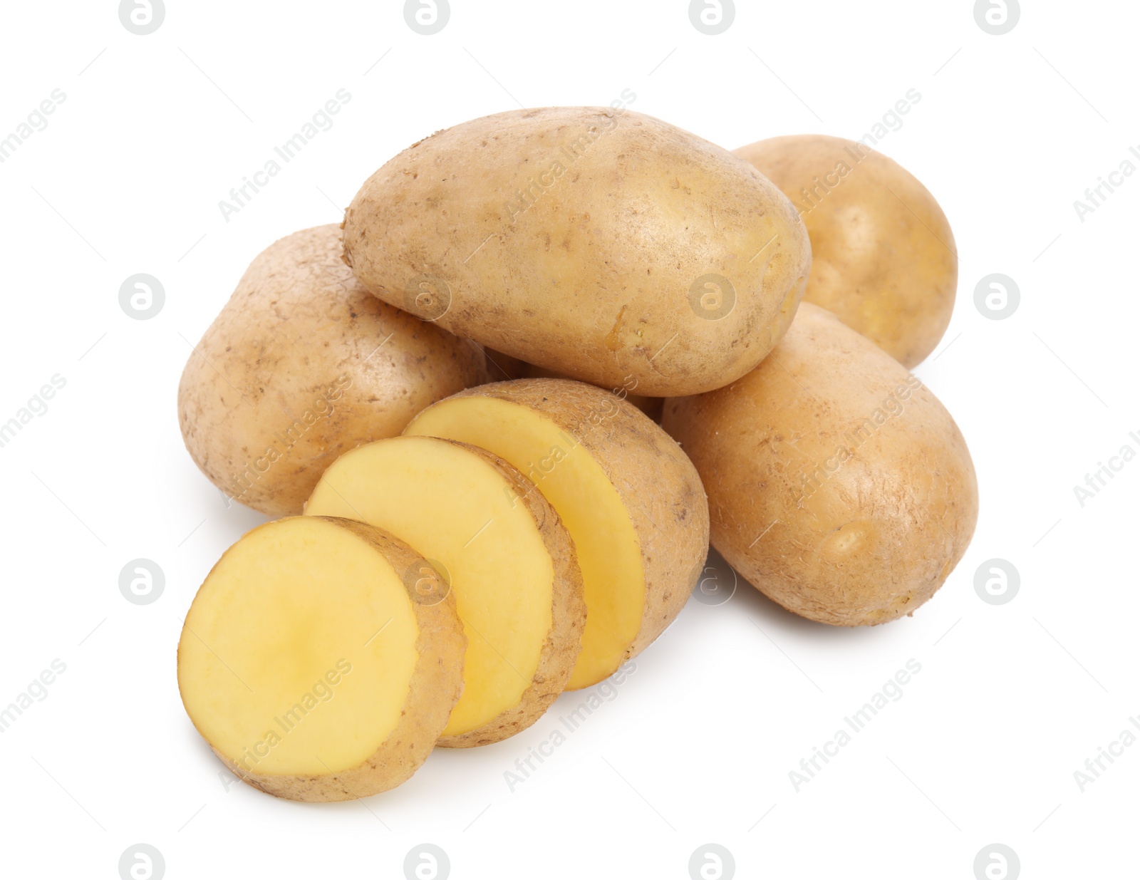 Photo of Whole and cut fresh potatoes on white background