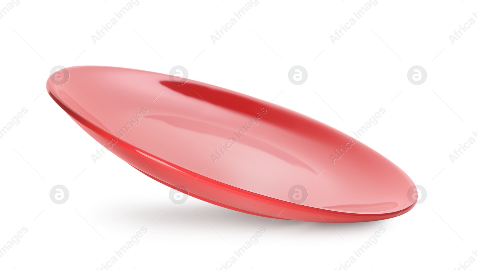 Photo of Clean empty red plate isolated on white