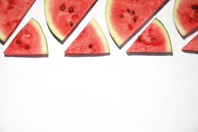 Slices of ripe watermelon on white background, flat lay. Space for text