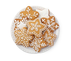 Photo of Tasty star shaped Christmas cookies with icing isolated on white, top view