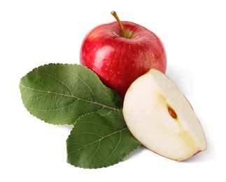 Photo of Whole, cut red apples and leaves isolated on white