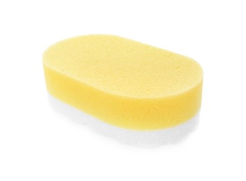 Photo of One new yellow sponge isolated on white