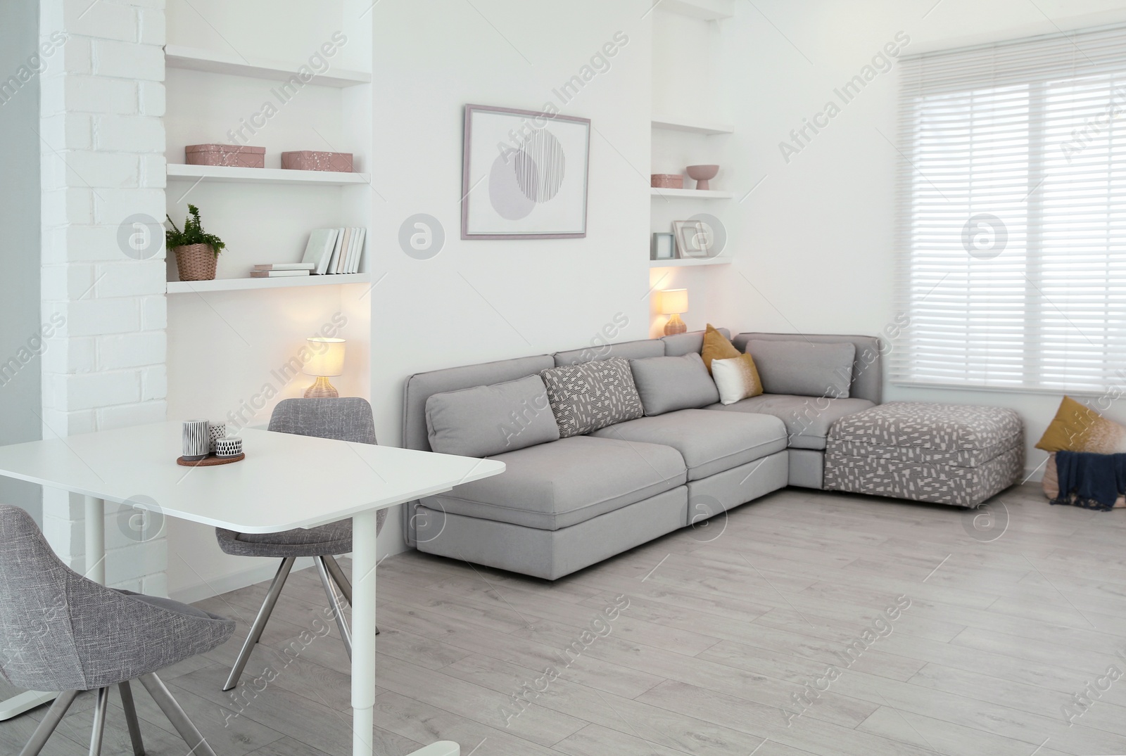 Photo of Comfortable furniture and accessories in stylish living room