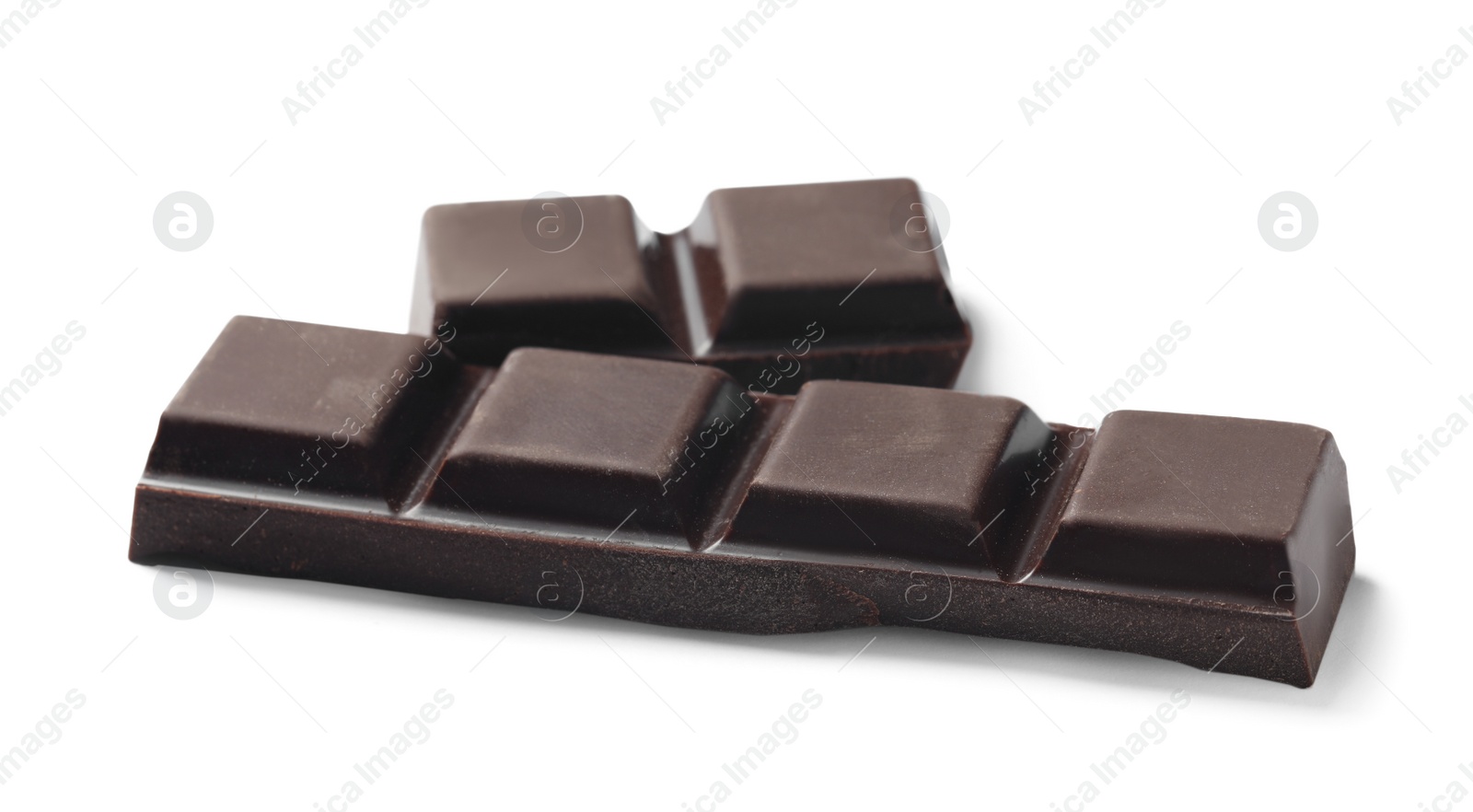 Photo of Pieces of delicious dark chocolate isolated on white