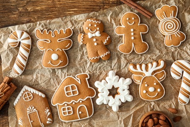 Flat lay composition with delicious homemade Christmas cookies on wooden table