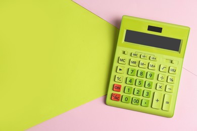 Modern calculator on color background, top view. Space for text