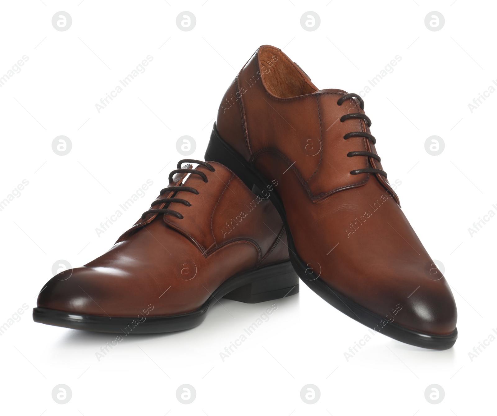 Photo of Classic wedding shoes for groom on white background