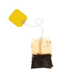 Used tea bag with tag isolated on white