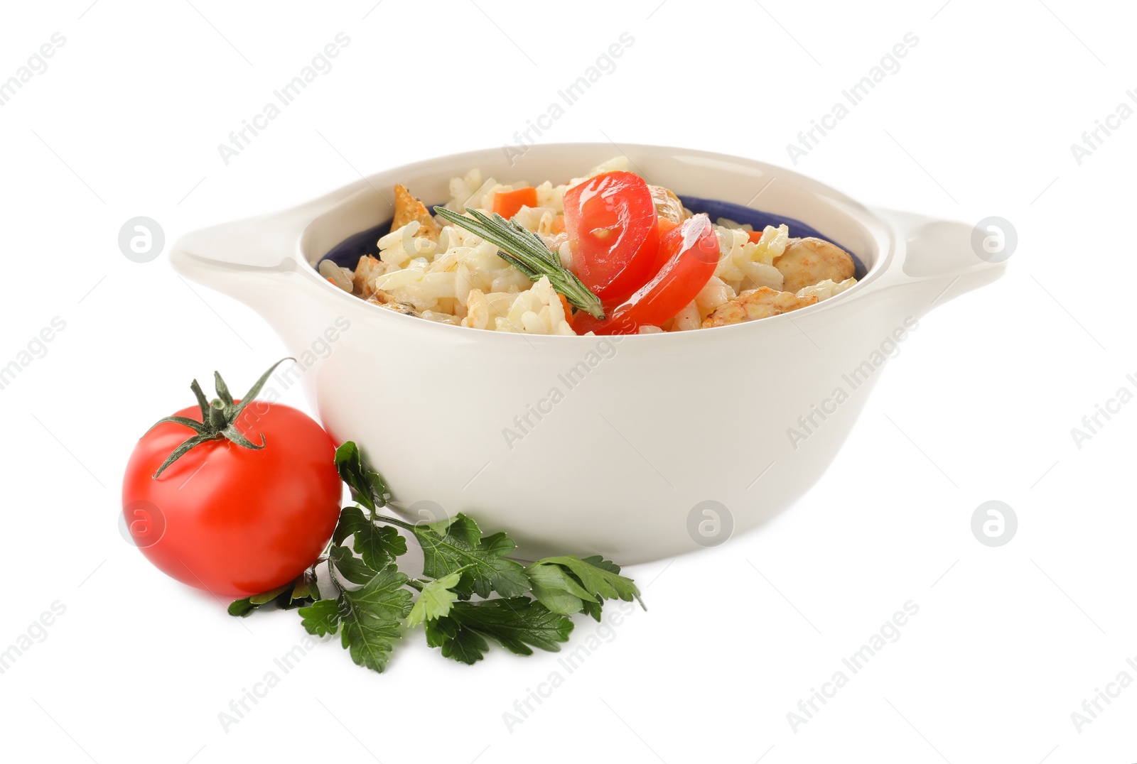 Photo of Delicious chicken risotto and fresh tomato with parsley isolated on white