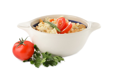 Delicious chicken risotto and fresh tomato with parsley isolated on white