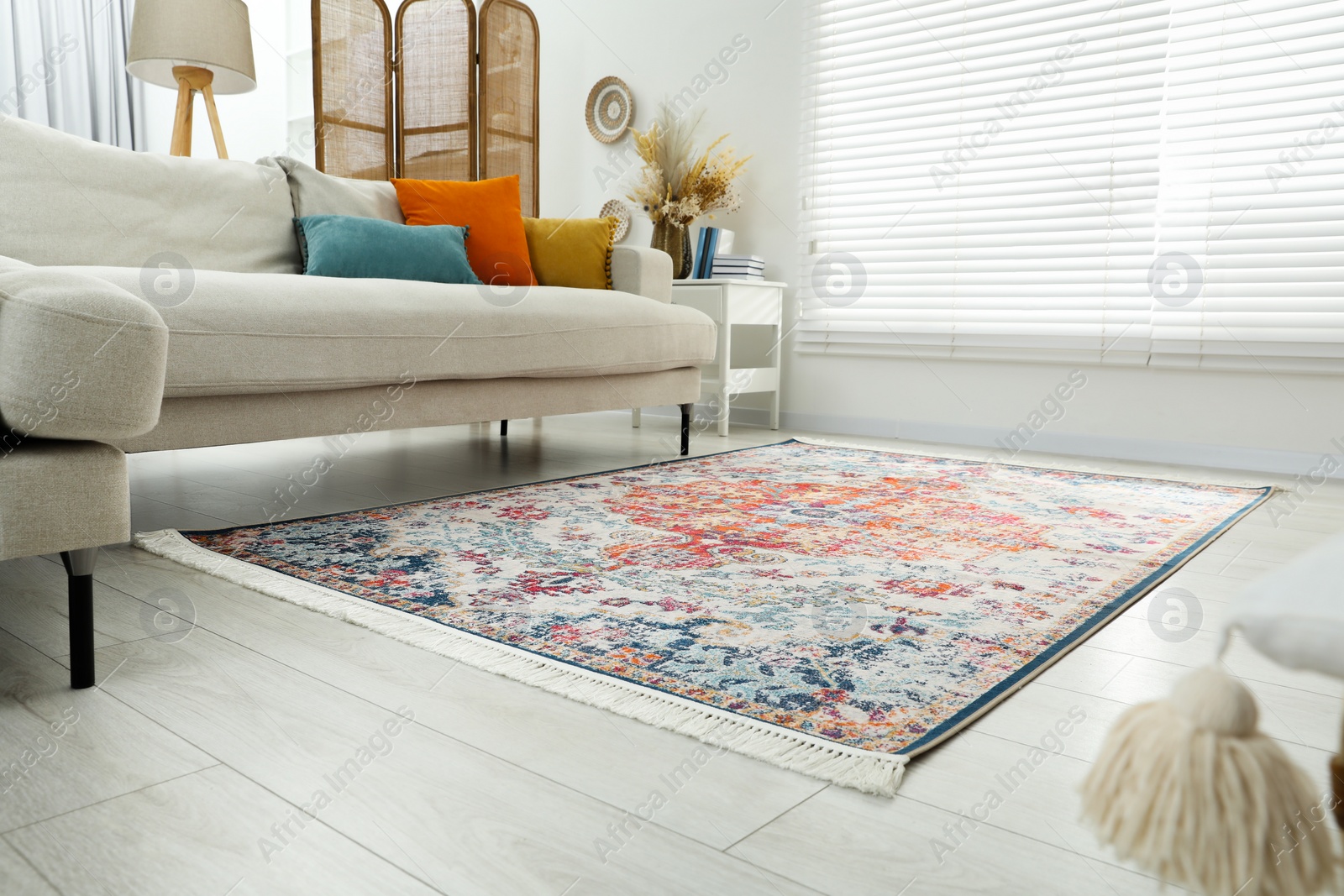 Photo of Stylish living room with beautiful carpet and furniture. Interior design