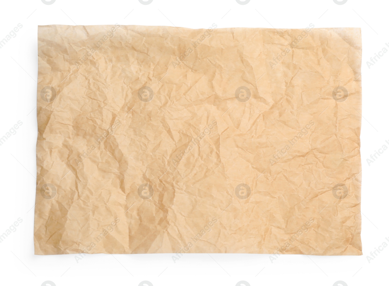 Photo of Sheet of crumpled brown baking paper on white background, top view