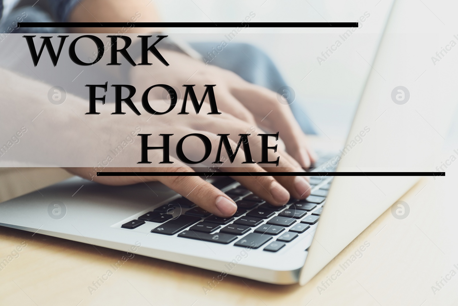 Image of Man using modern laptop at wooden table indoors, closeup. Work from home