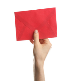 Woman holding red paper envelope on white background, closeup