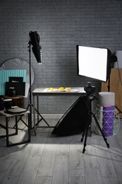 Photo studio with professional lighting equipment for shooting food