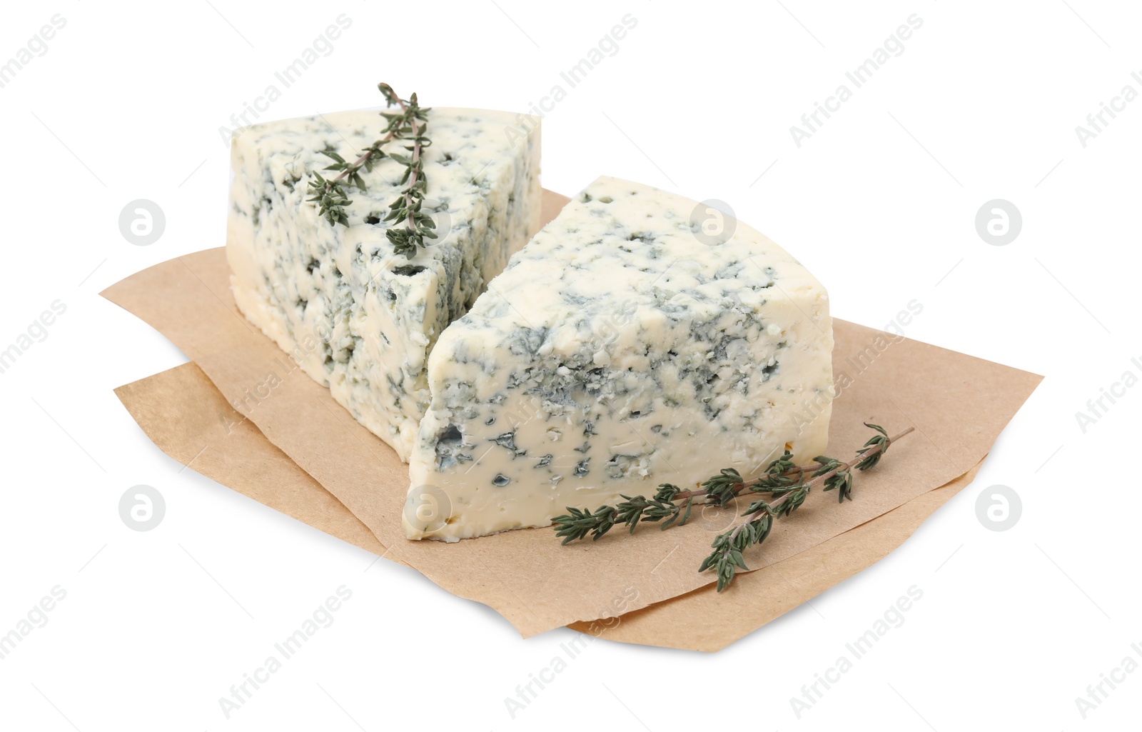 Photo of Tasty blue cheese with thyme isolated on white