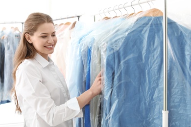 Employee working at dry-cleaner's