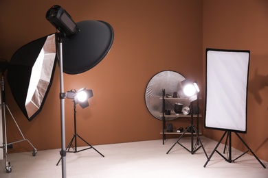 Photo of Interior of modern photo studio with professional equipment