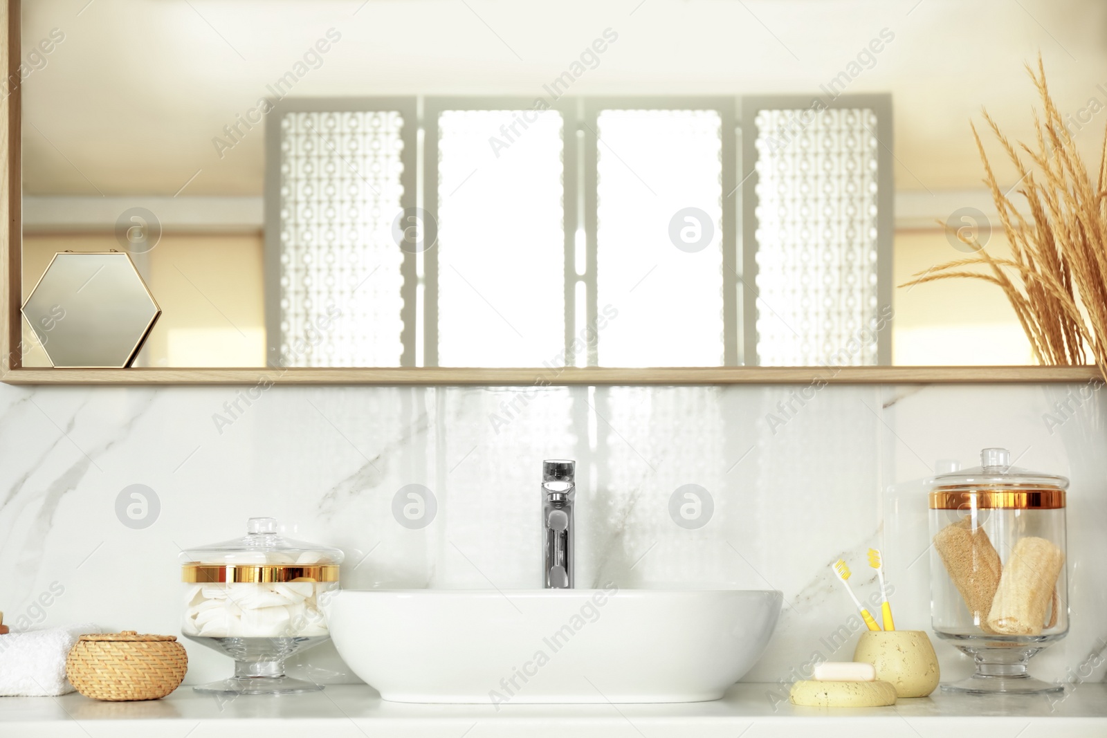 Photo of Modern bathroom interior with big stylish mirror