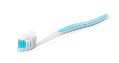 Plastic toothbrush with paste on grey background