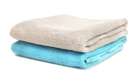 Photo of Clean soft towels on white background