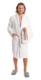 Photo of Young man in bathrobe with towel on white background