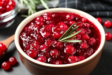 Delicious cranberry sauce in bowl, closeup view