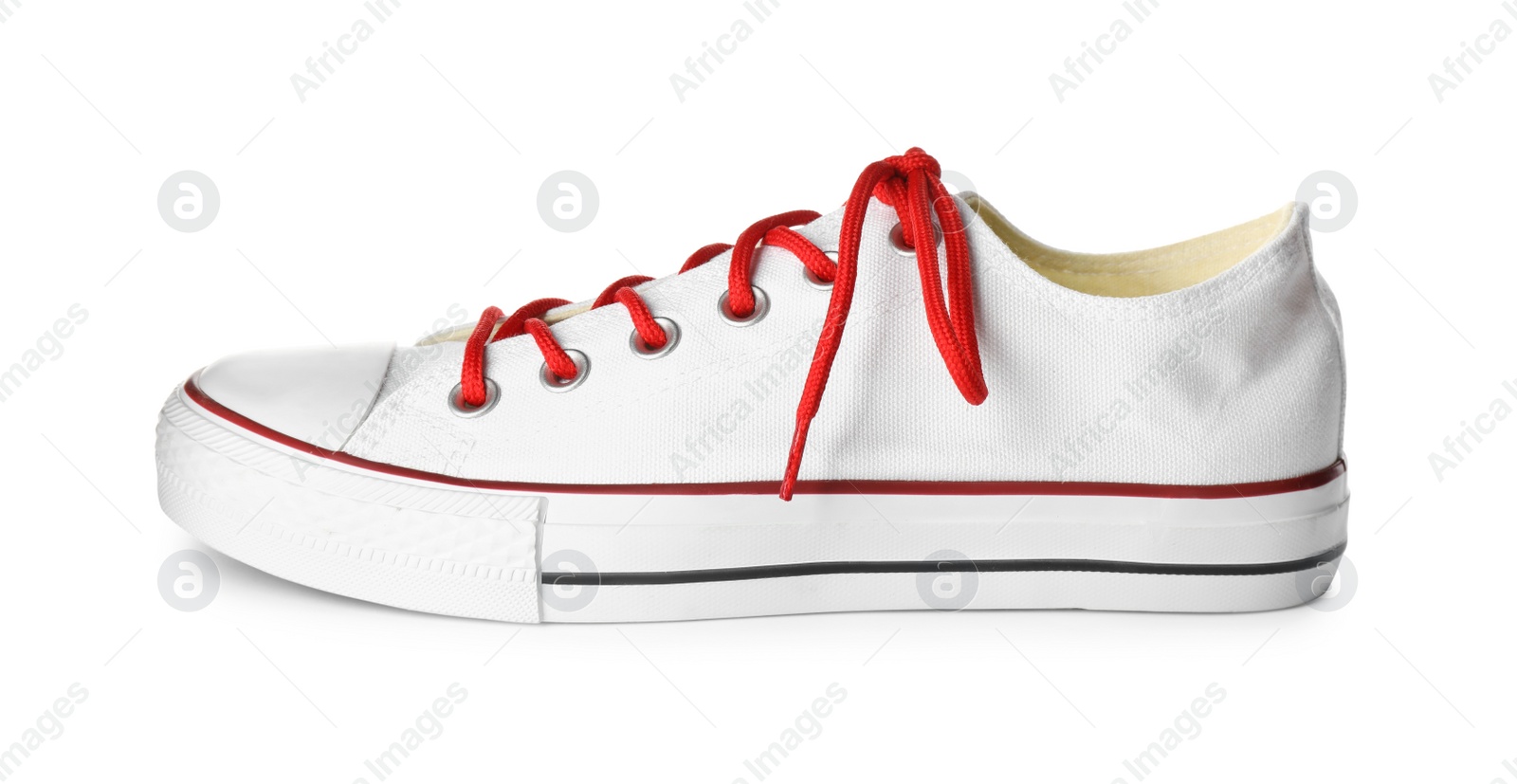 Photo of One sneaker isolated on white. Trendy shoes