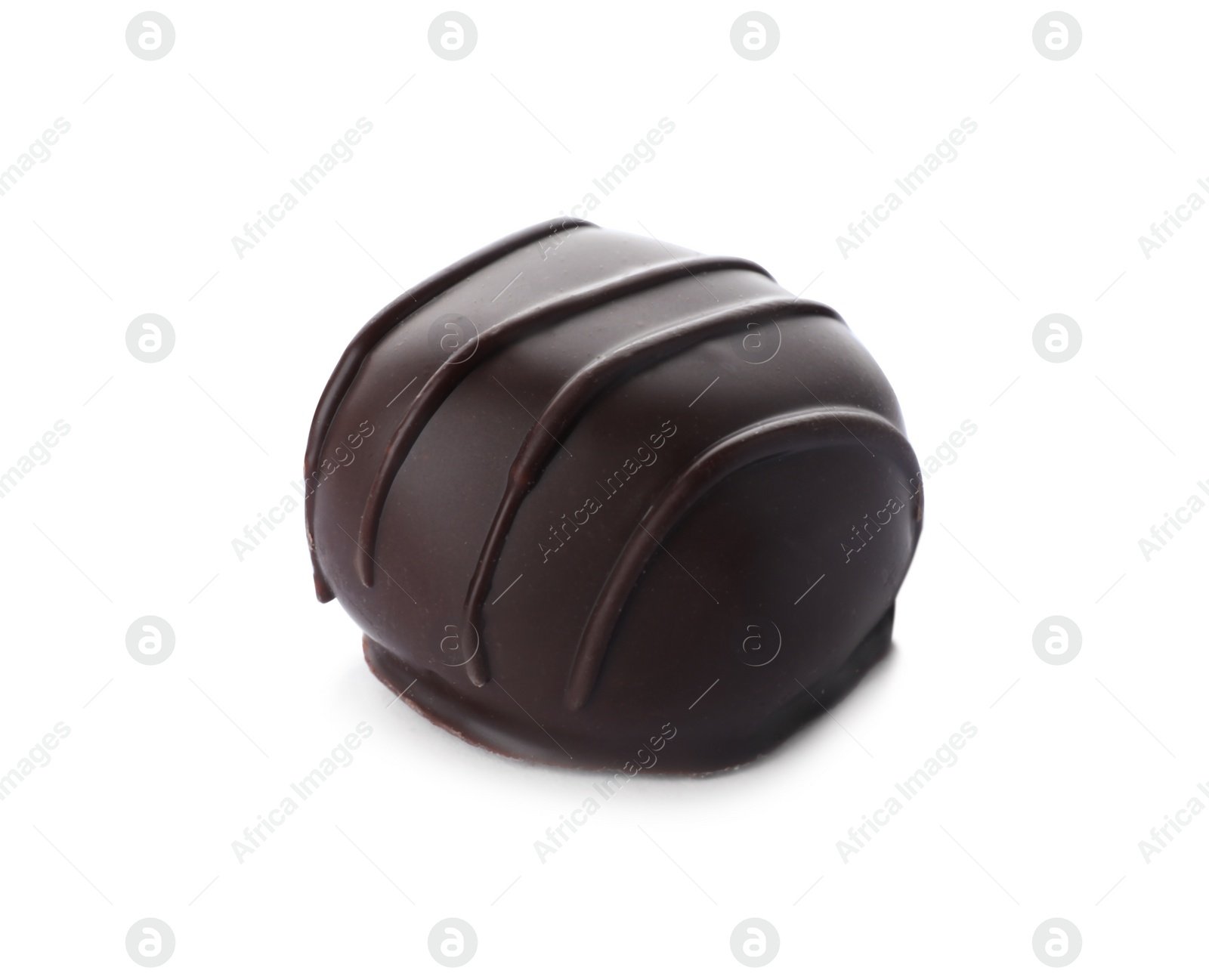 Photo of Delicious dark chocolate candy isolated on white