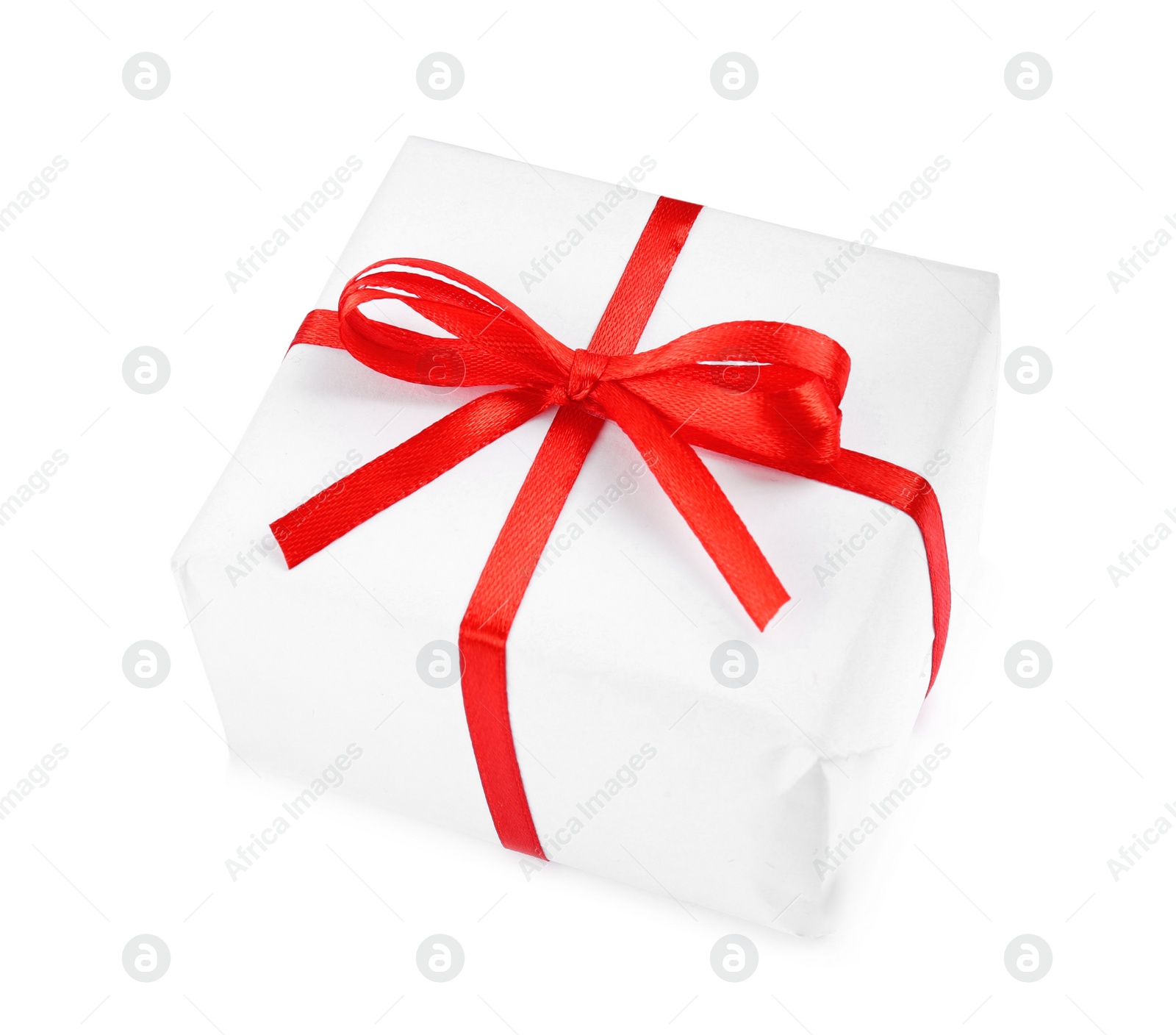 Photo of Beautiful gift box with red bow isolated on white