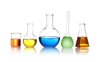 Laboratory glassware with color liquids on white background