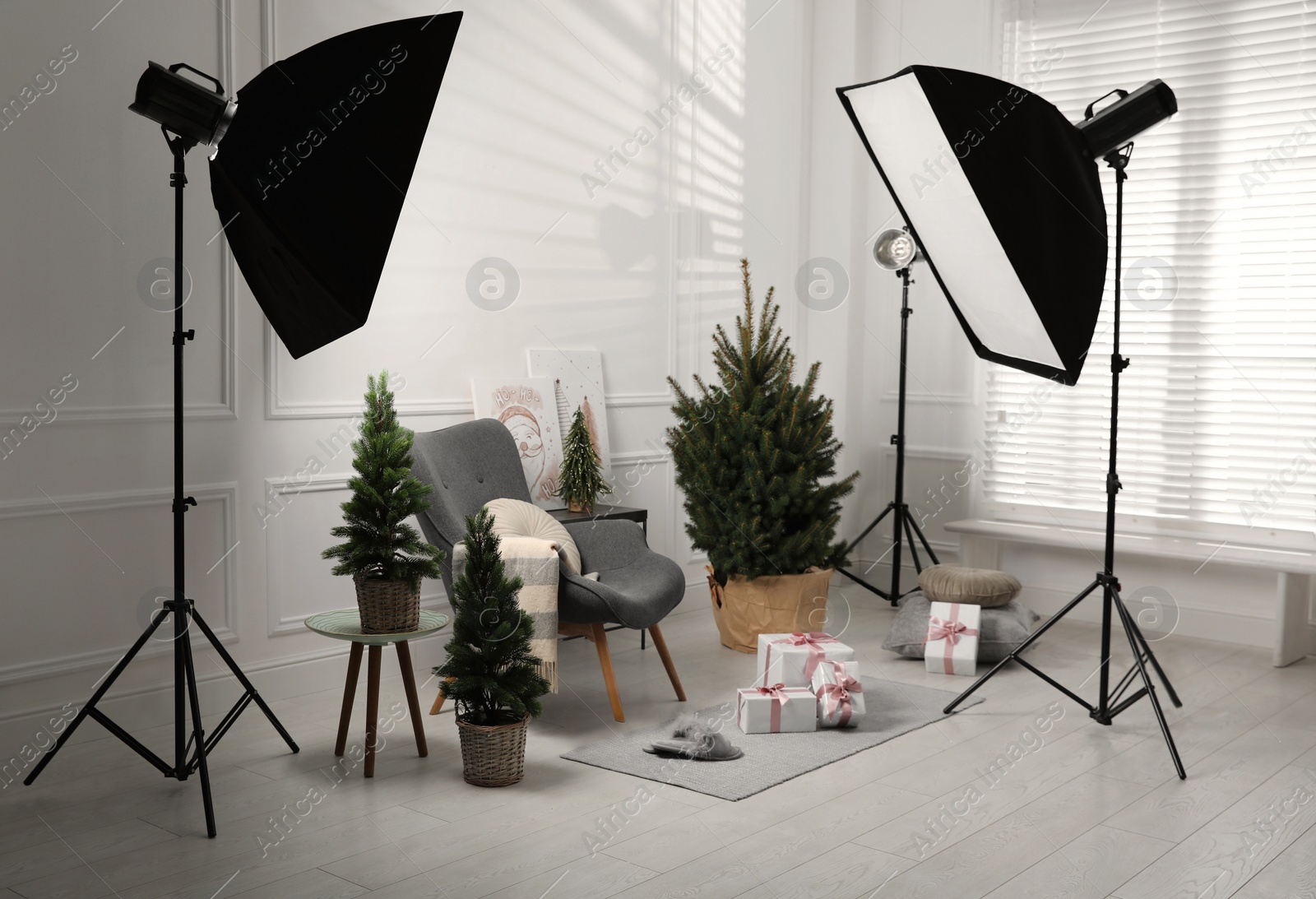 Photo of Beautiful Christmas themed photo zone. Cozy living room interior imitation