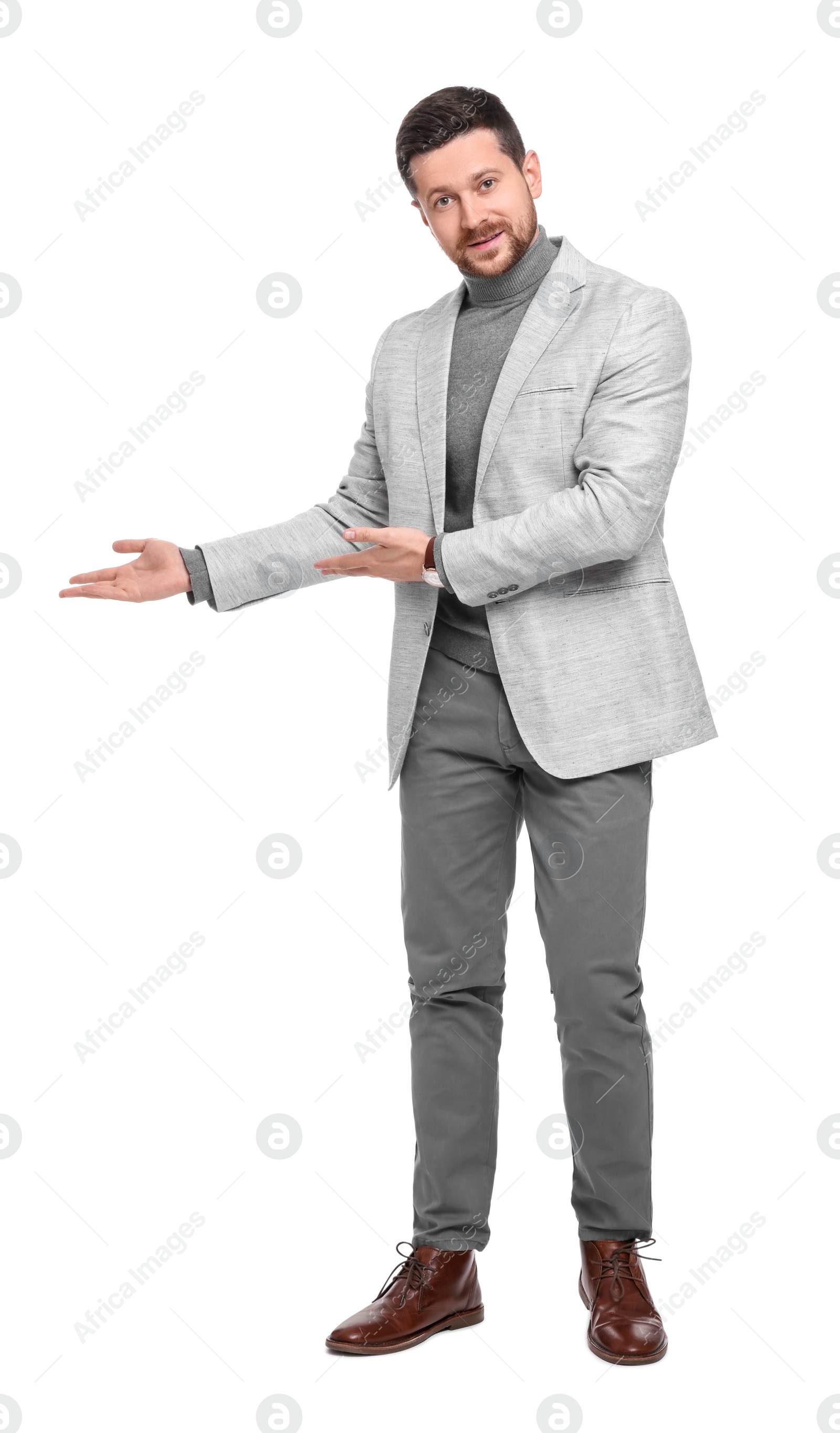 Photo of Handsome bearded businessman in suit on white background