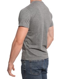 Photo of Man wearing grey t-shirt on white background, closeup. Mockup for design