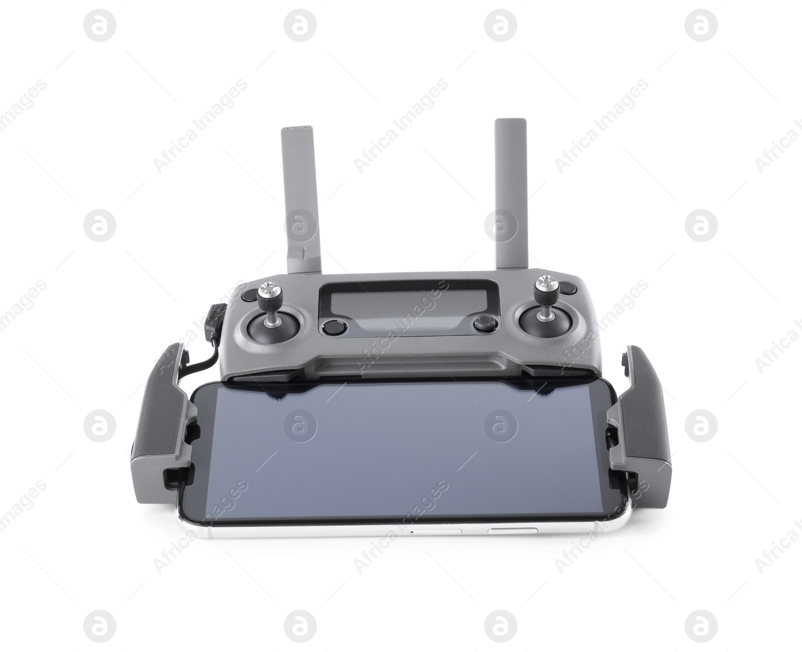 Photo of Drone controller with smartphone isolated on white