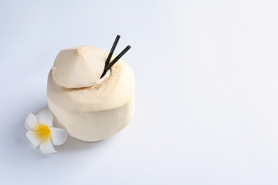 Fresh coconut drink in nut on white background