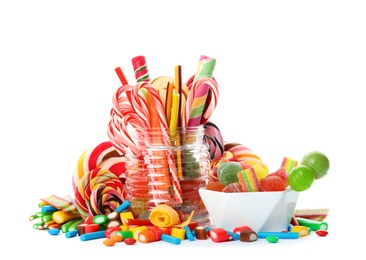 Photo of Composition with many different yummy candies on white background
