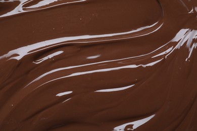 Tasty chocolate paste as background, closeup view