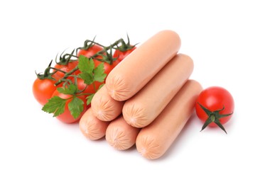 Delicious boiled sausages, tomatoes and parsley on white background