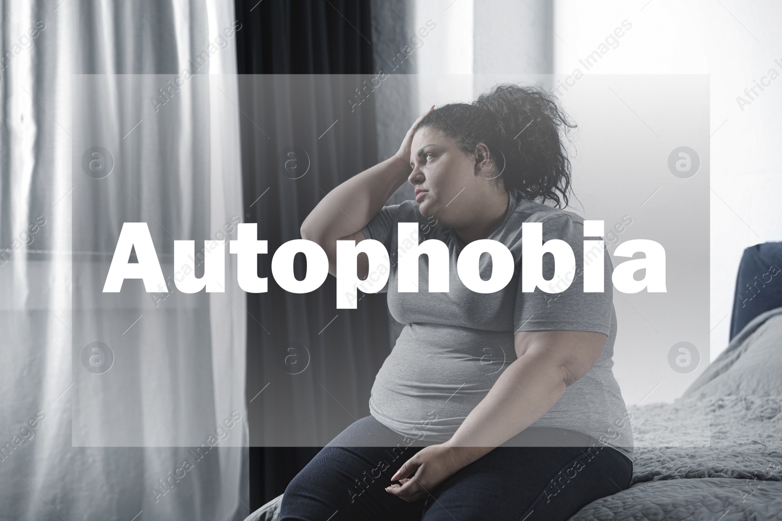 Image of Depressed overweight woman sitting alone on bed at home. Autophobia - fear of isolation