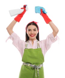 Photo of Young housewife with detergent and rug on white background