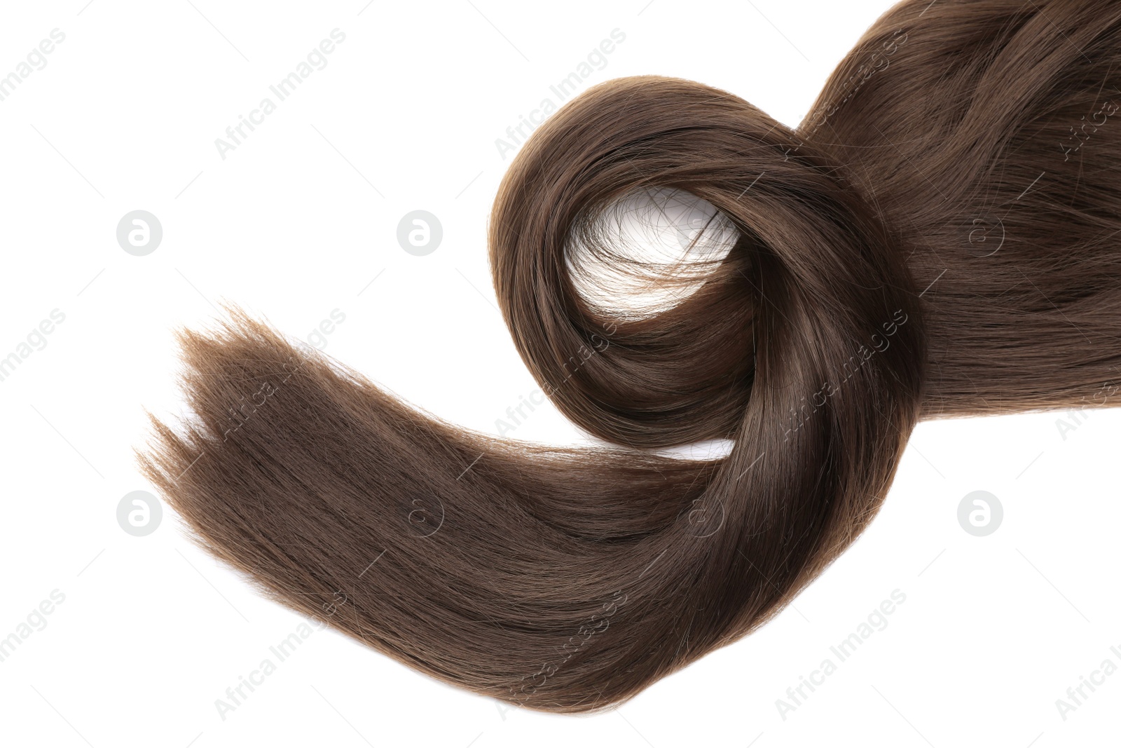 Photo of Beautiful strand of dark brown hair on white background, top view