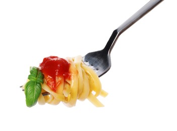 Photo of Fork with tasty pasta, basil and tomato sauce isolated on white