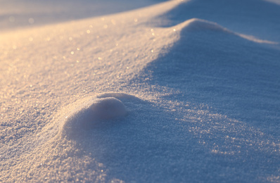 Photo of Beautiful snowdrift as background, closeup view. Winter weather