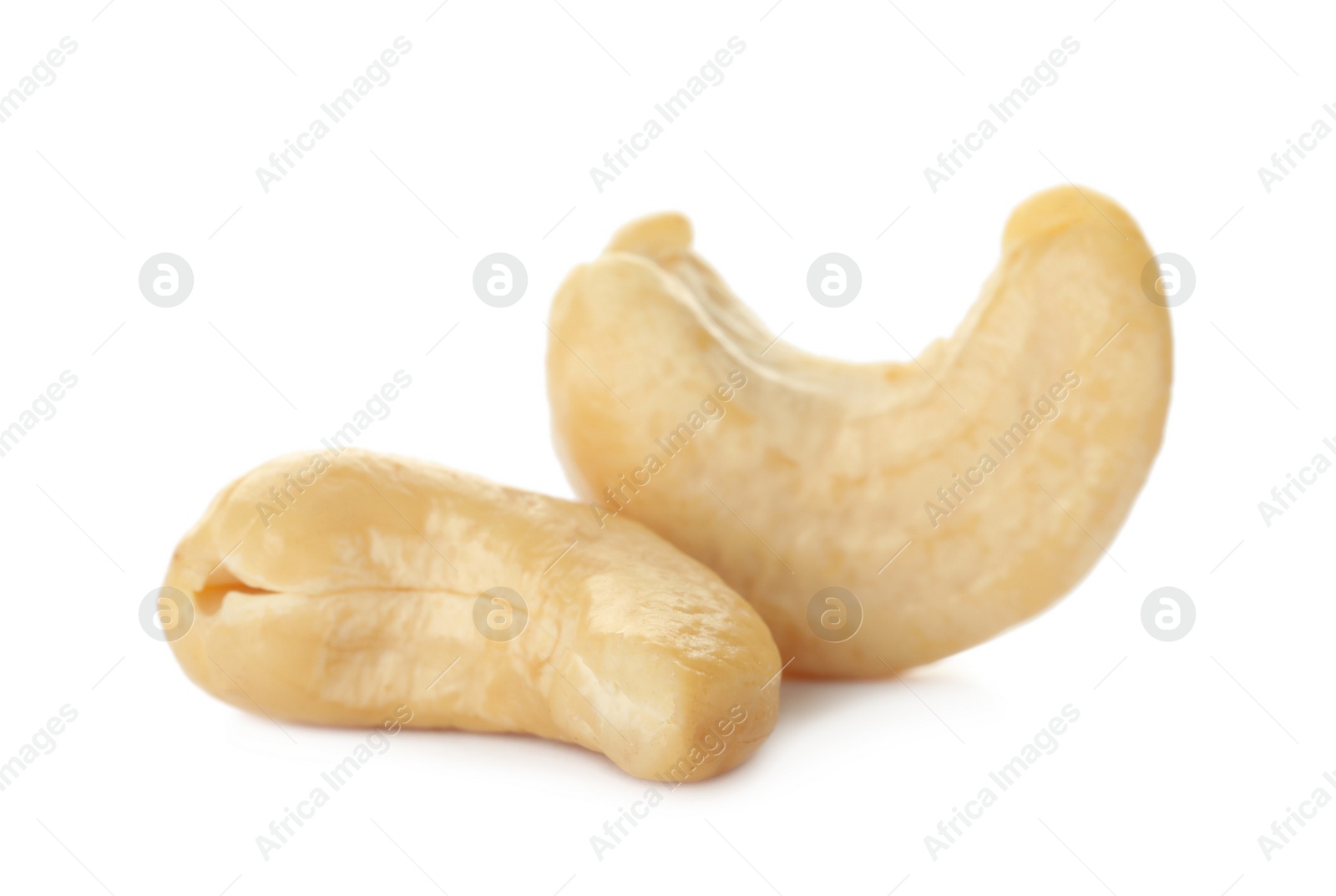 Photo of Tasty organic cashew nuts isolated on white