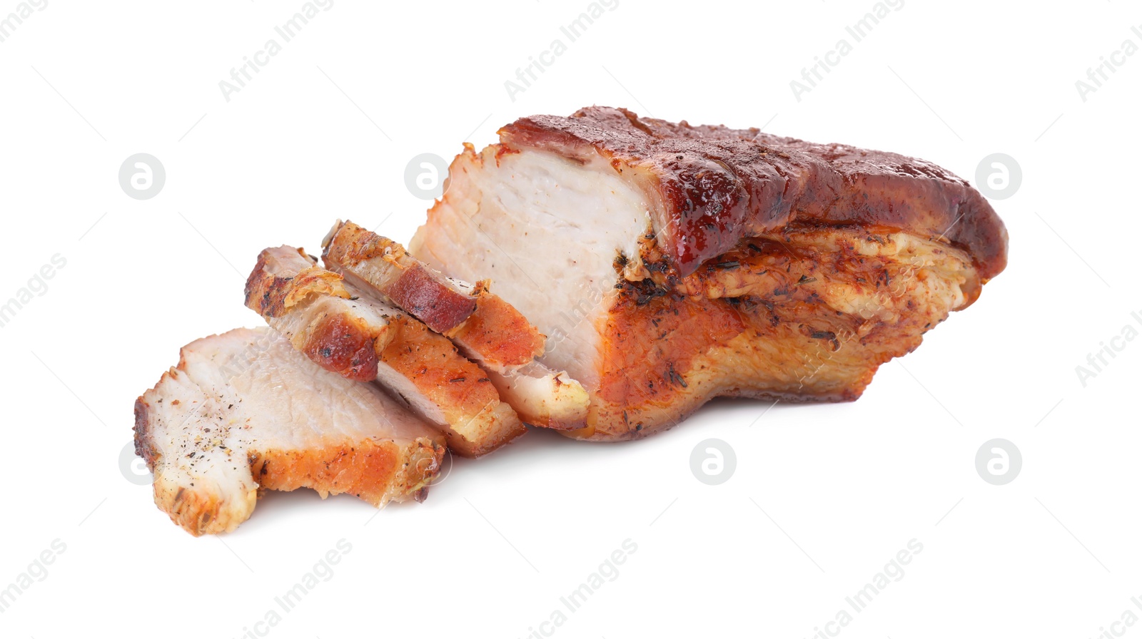 Photo of Pieces of tasty baked pork belly isolated on white