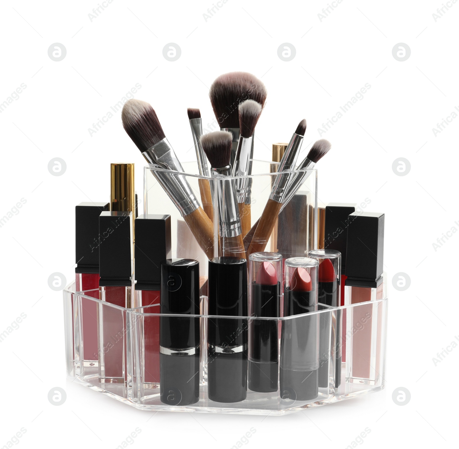 Photo of Lipstick holder with different makeup products on white background