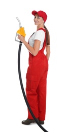 Gas station worker with fuel nozzle on white background